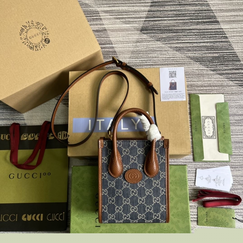 G*u*i top handle bags